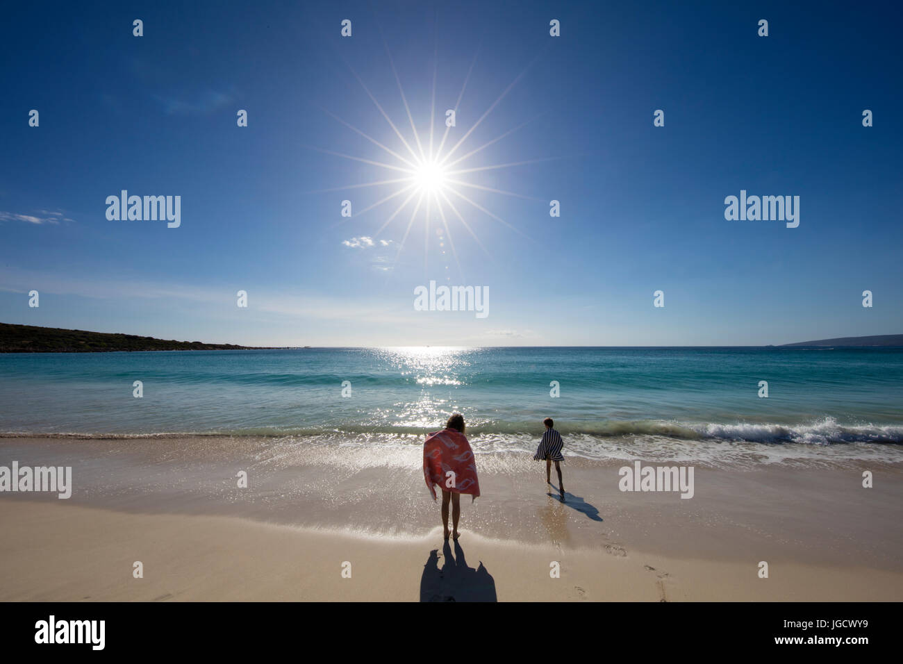 Boy and girl playing on the beach, Western Australia, Australia Stock Photo
