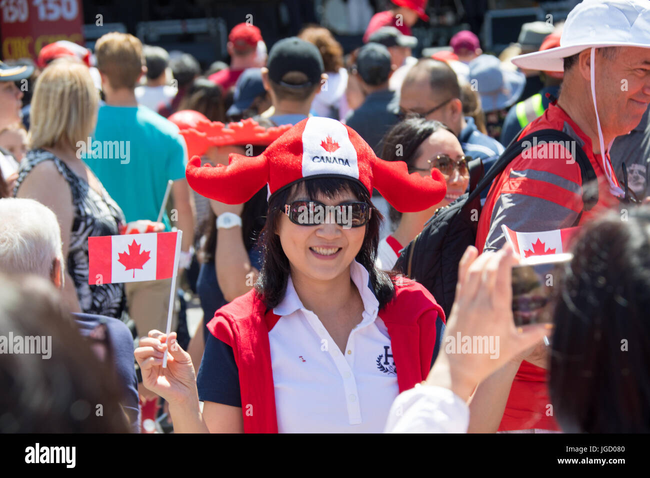 Asian Canadian Celebrates the Canada 150 Day in Vancouver, July, 1, 2017, Canada Day 150, Vancouver, Canada Stock Photo