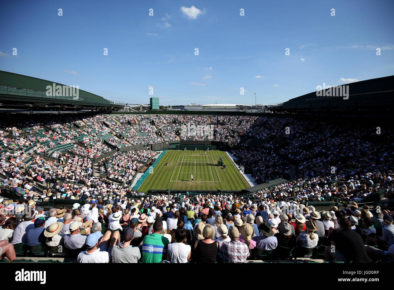 Venus Williams in action against Qiang Wang on court one on day three of the Wimbledon Championships at The All England Lawn Tennis and Croquet Club, Wimbledon. Stock Photo