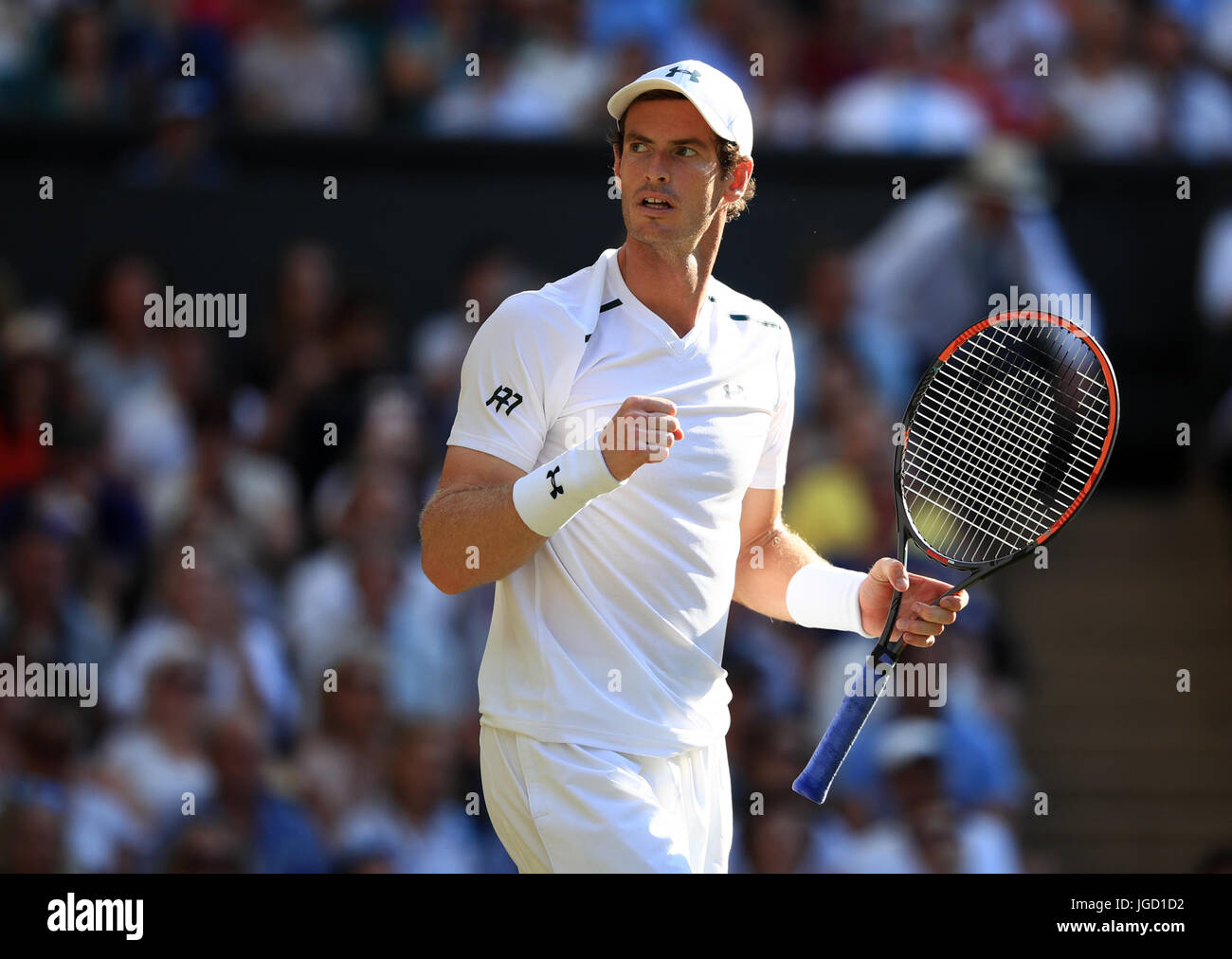 Andy Murray celebrates victory over Dustin Brown on day three of the ...