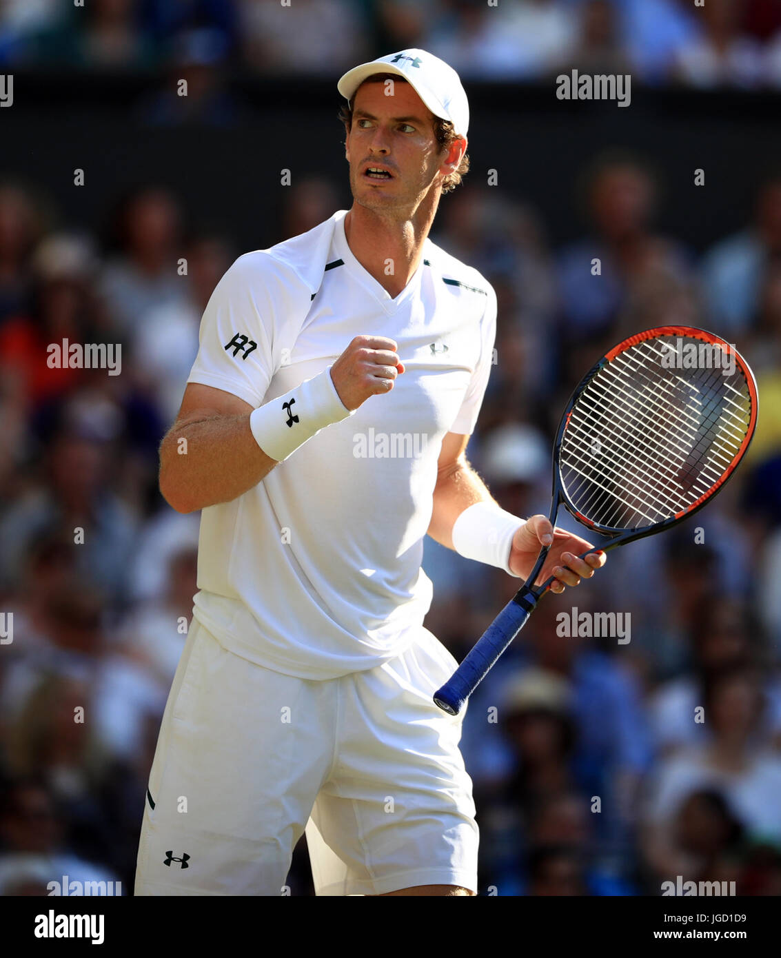 Andy Murray celebrates victory over Dustin Brown on day three of the ...