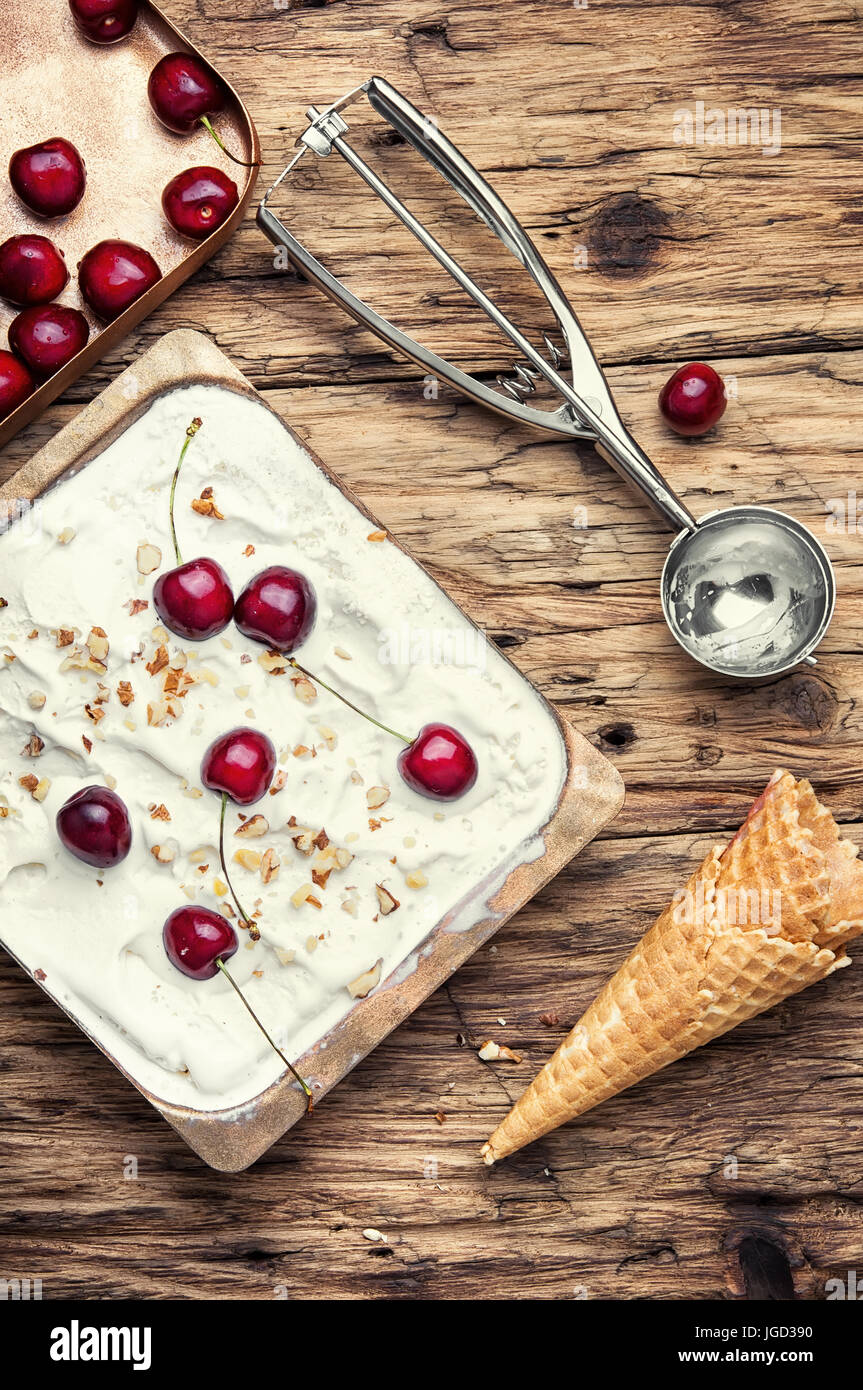 Sundae.Ice cream in waffle cones and cherry berries Stock Photo
