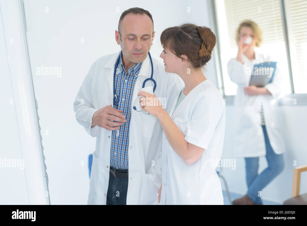 Nurse young doctor flirting work hires stock photography and images