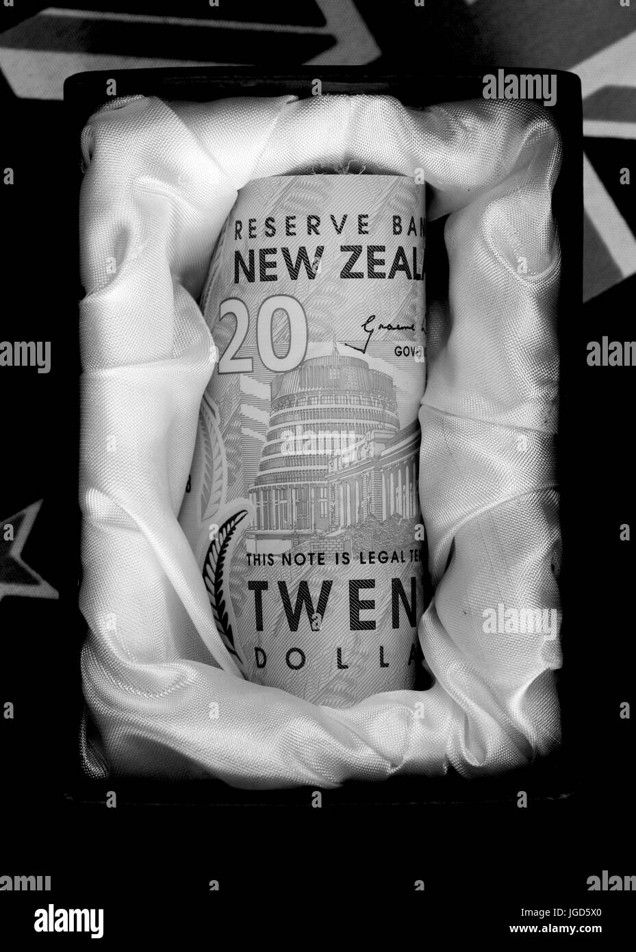 New Zealand twenty dollar note in a casket (black and white) Stock Photo