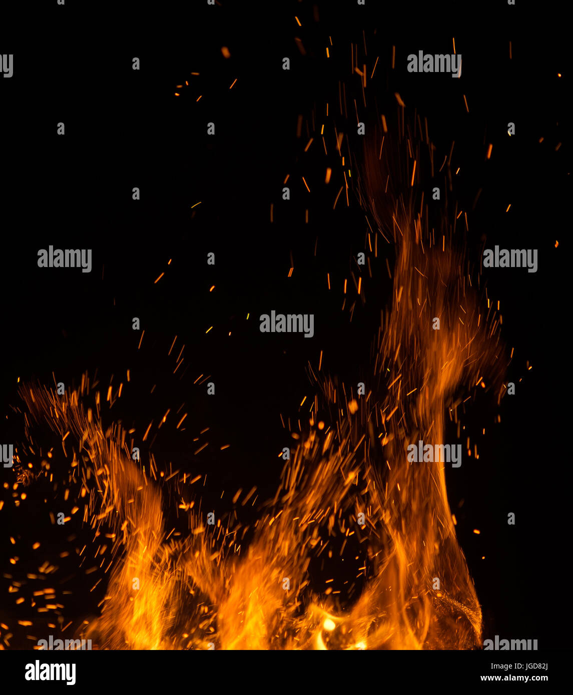fire flames with sparks on black background Stock Photo - Alamy