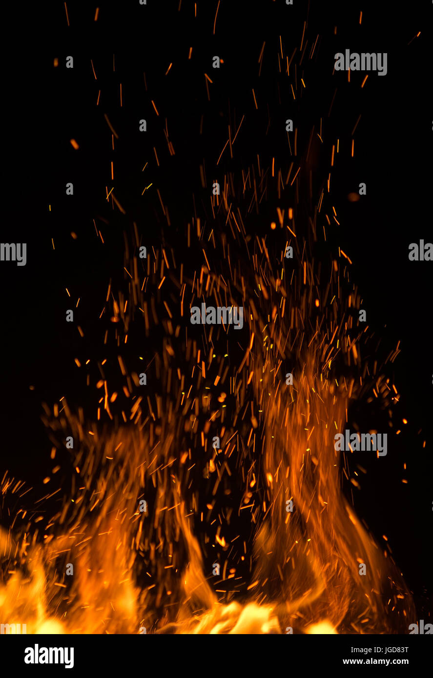 fire flames with sparks on black background Stock Photo - Alamy