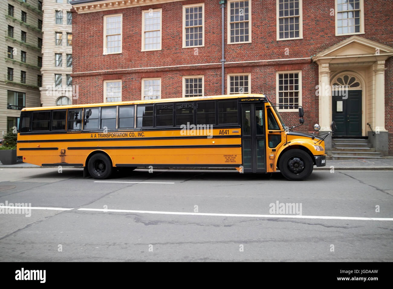 yellow us school bus saf-t-liner c2 downtown Boston USA Stock Photo