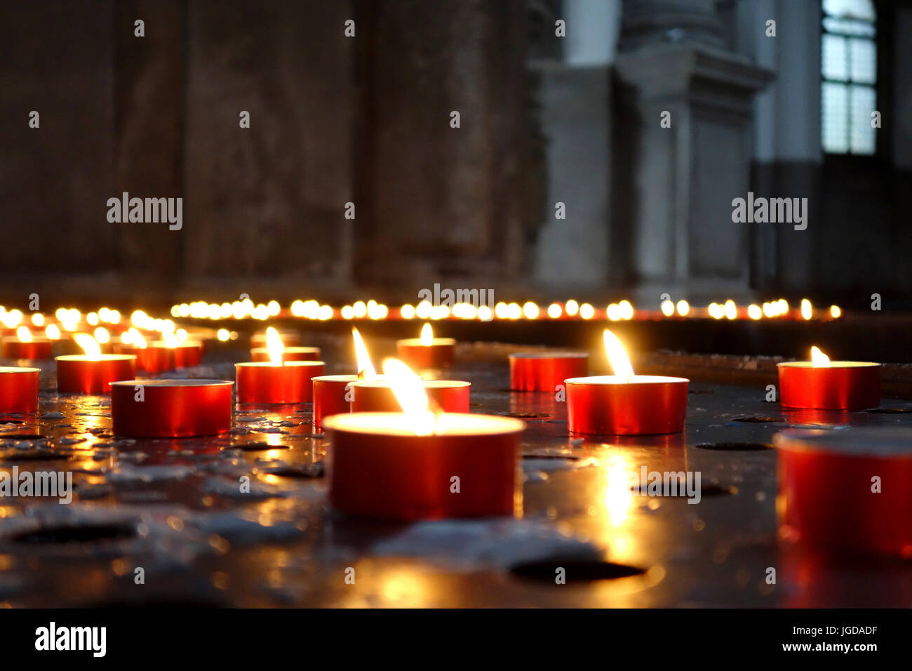Lit prayer candles in a Catholic church, Venice, Italy Stock Photo Alamy