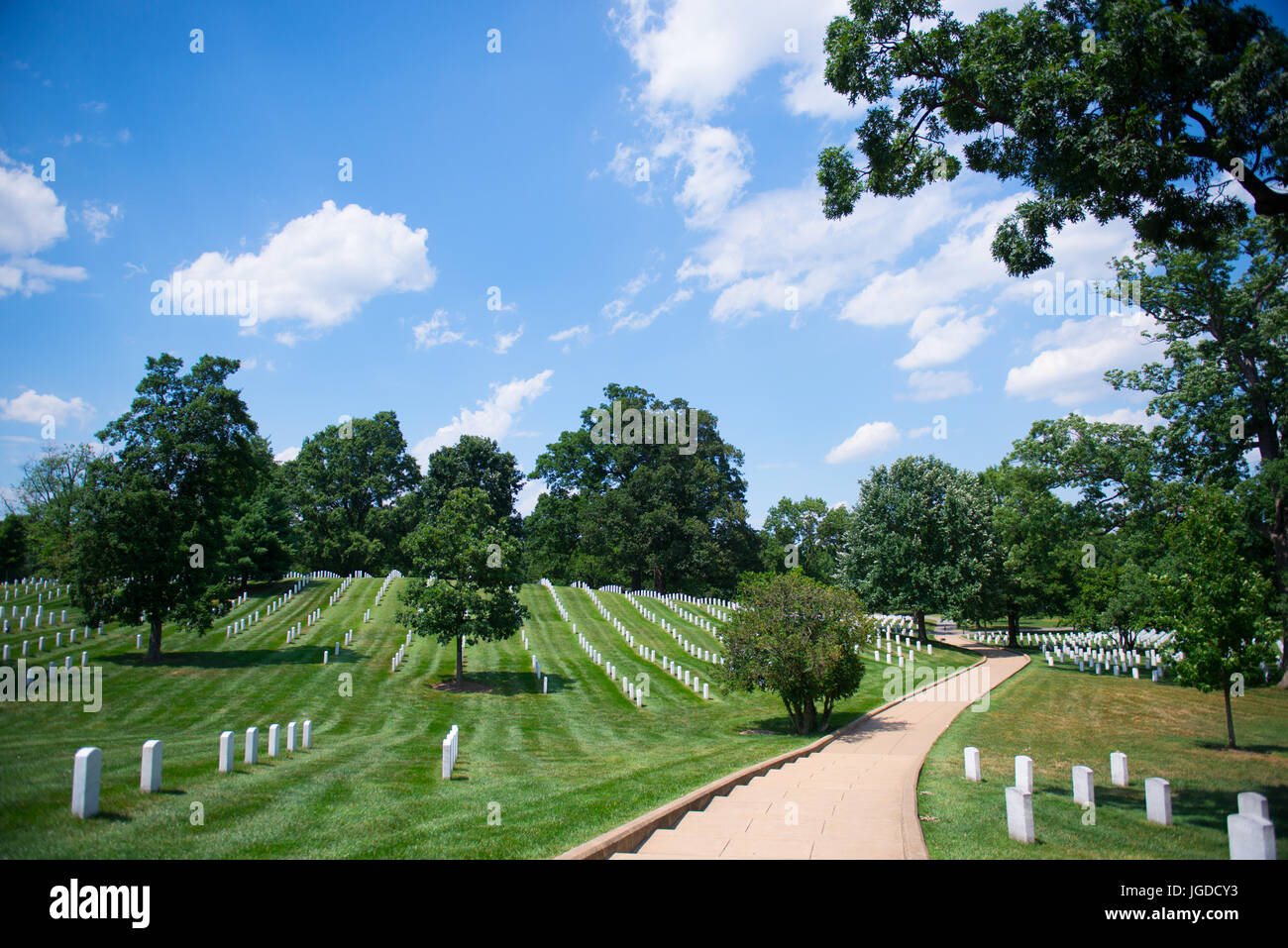 The first day of summer in Section 36 of Arlington National Cemetery, Arlington, Va., June 21, 2017.  The cemetery’s 651 acres is the final resting place for more than 400,000 active duty service members, veterans and their families. (U.S. Army photo by Elizabeth Fraser/Arlington National Cemetery/released) Stock Photo
