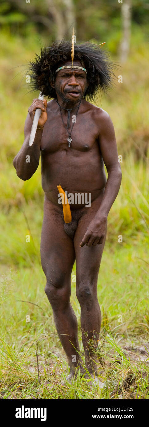 DANI VILLAGE, WAMENA, IRIAN JAYA, NEW GUINEA, INDONESIA – 25 JULY 2009: Dani tribe Warriors. July 2009, 2012 The Baliem Valley, Indonesian, New Guinea Stock Photo