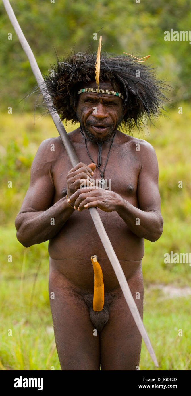 DANI VILLAGE, WAMENA, IRIAN JAYA, NEW GUINEA, INDONESIA – 25 JULY 2009: Dani tribe Warriors. July 2009, 2012 The Baliem Valley, Indonesian, New Guinea Stock Photo