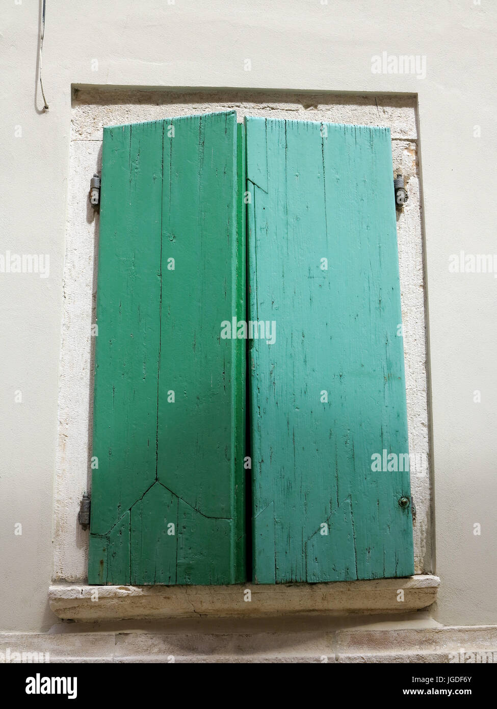 Rustic Window shutters green Stock Photo