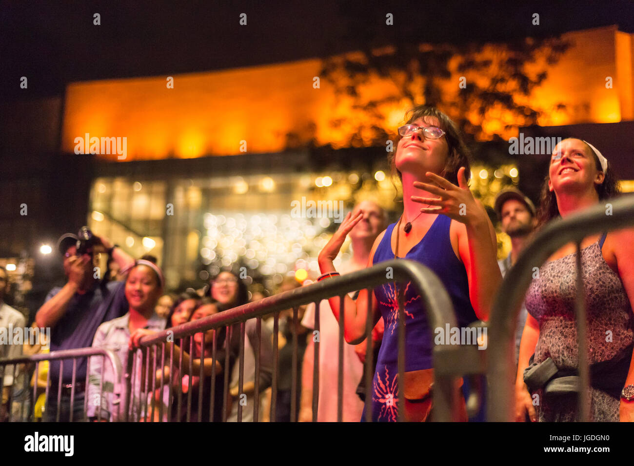 Montreal, 4 July 2017: Young woman in ecstasy at the end of  'Ghost Town Blues Band' performance at Montreal Jazz Festival Stock Photo