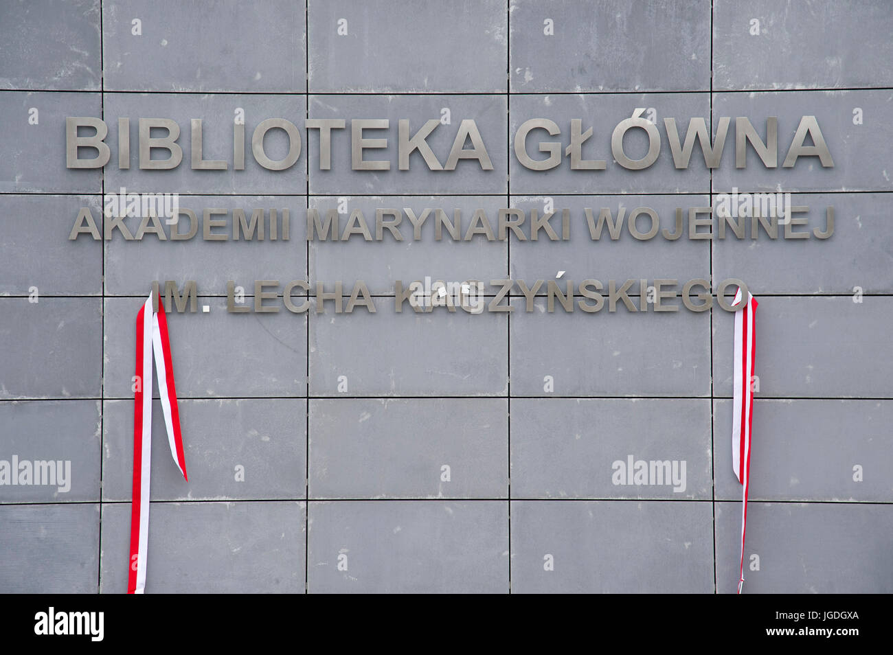 Inscription with Polish president Lech Kaczynski name given to Polish Naval Academy main library in Gdynia in occasion of 10th anniversary of Lech Kac Stock Photo