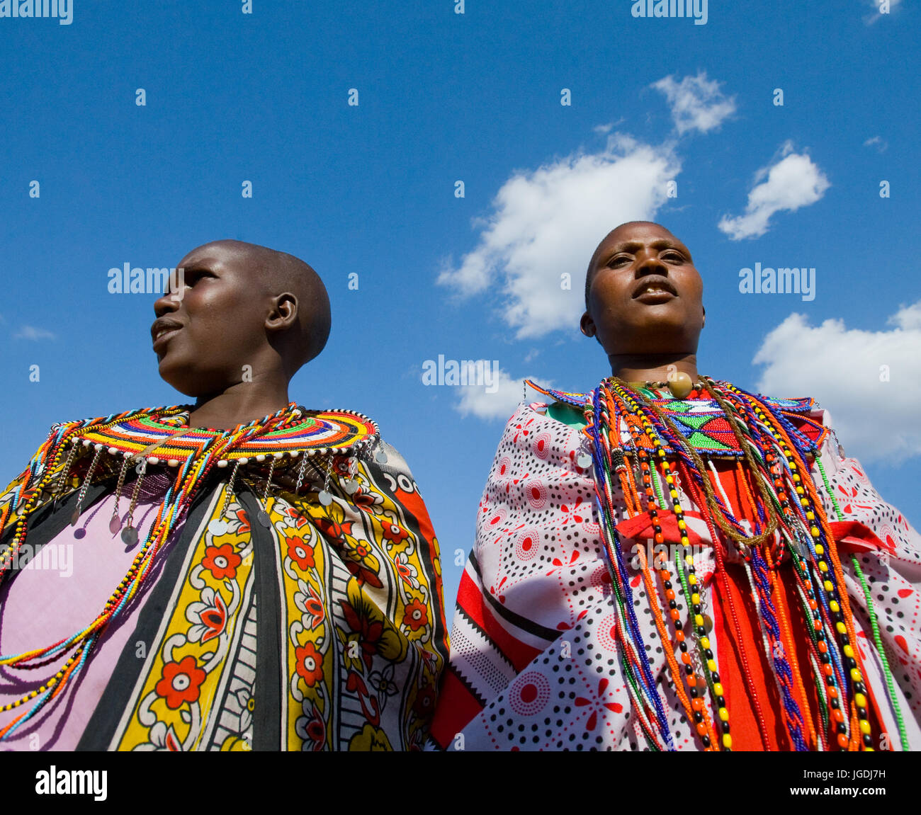 KENYA, MASAI MARA - JULY 19, 2011: Portrait of a Maasai woman in traditional clothing. Stock Photo