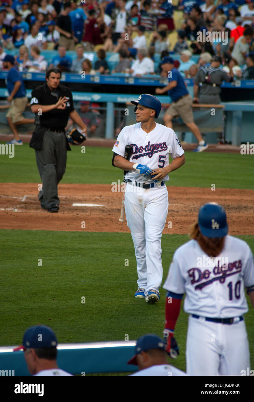 Dodger star player Corey Seager heads back to the dugout after