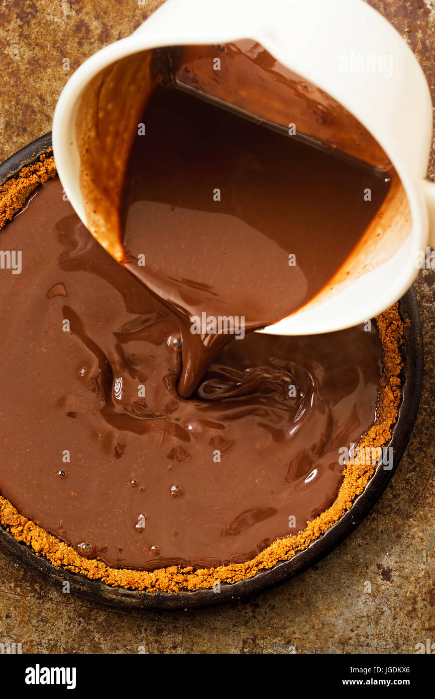 Baked pie base pastry filled with chocolate creme recipe Stock Photo