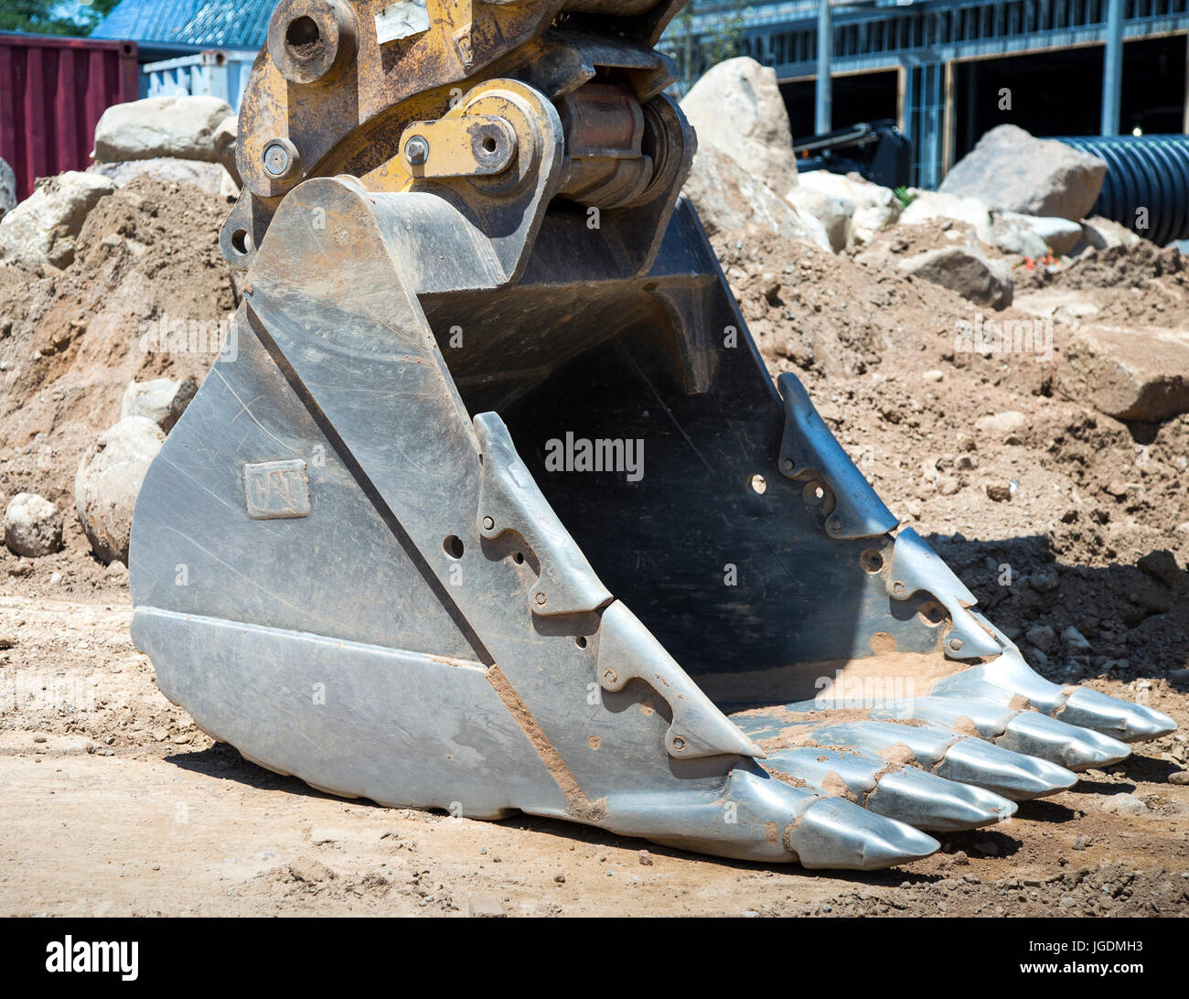 The bucket of a backhoe at a construction site Stock Photo