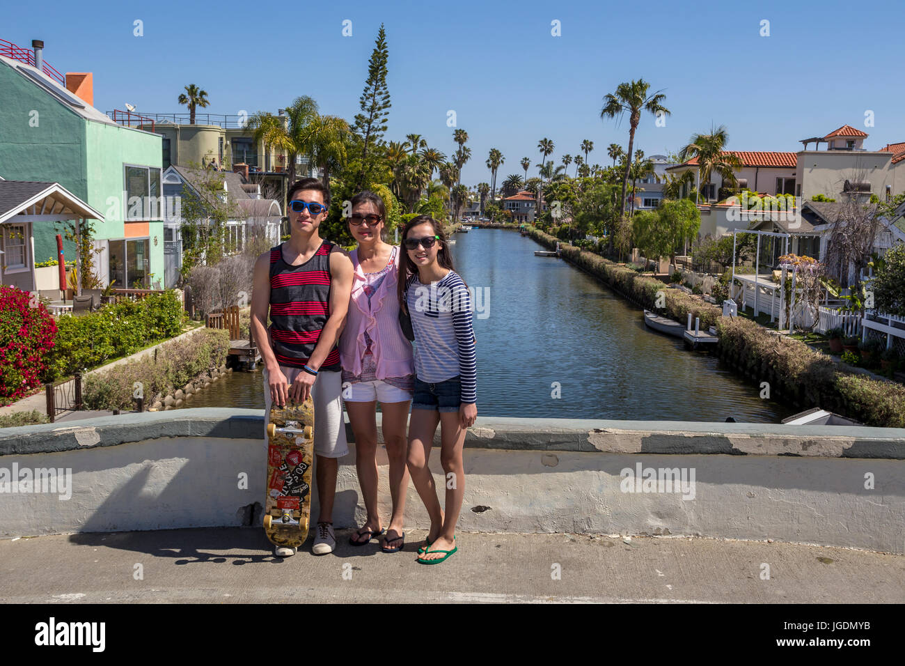 people, tourists, visitors, visiting, canal, Venice Canals, Venice Canal Historic District, Venice, Los Angeles, California, United States Stock Photo