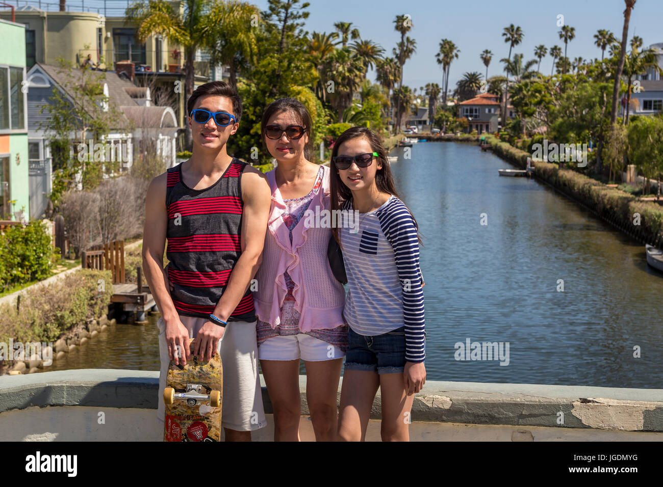people, tourists, visitors, visiting, canal, Venice Canals, Venice Canal Historic District, Venice, Los Angeles, California, United States Stock Photo