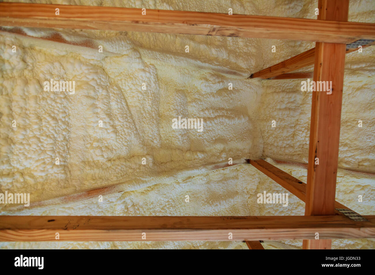 Foam Plastic Insulation Installed In The Sloping Ceiling Of