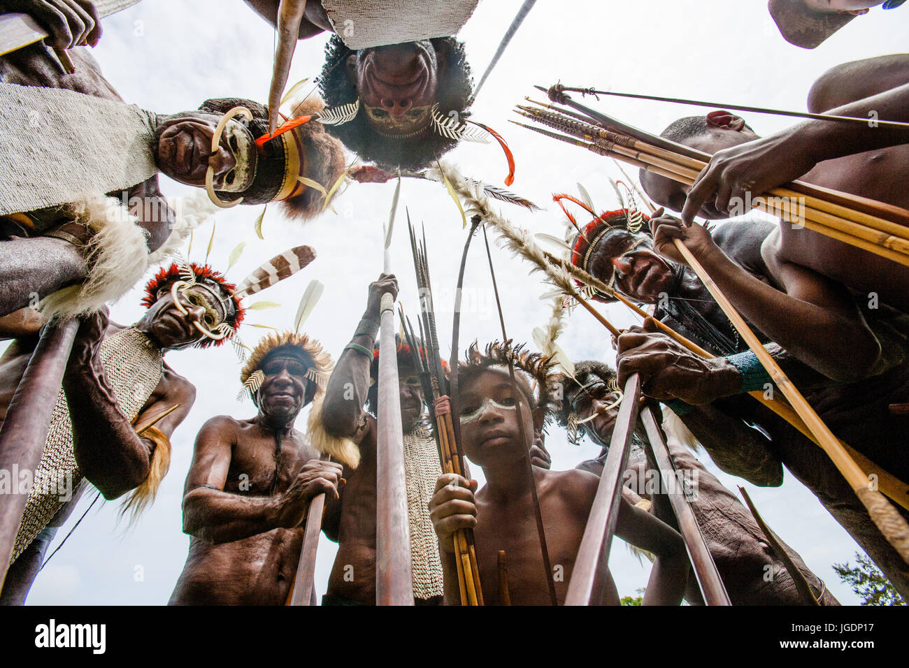 DANI VILLAGE, WAMENA, IRIAN JAYA, NEW GUINEA, INDONESIA – 15 MAY 2012: Dani tribe Warriors. Stock Photo