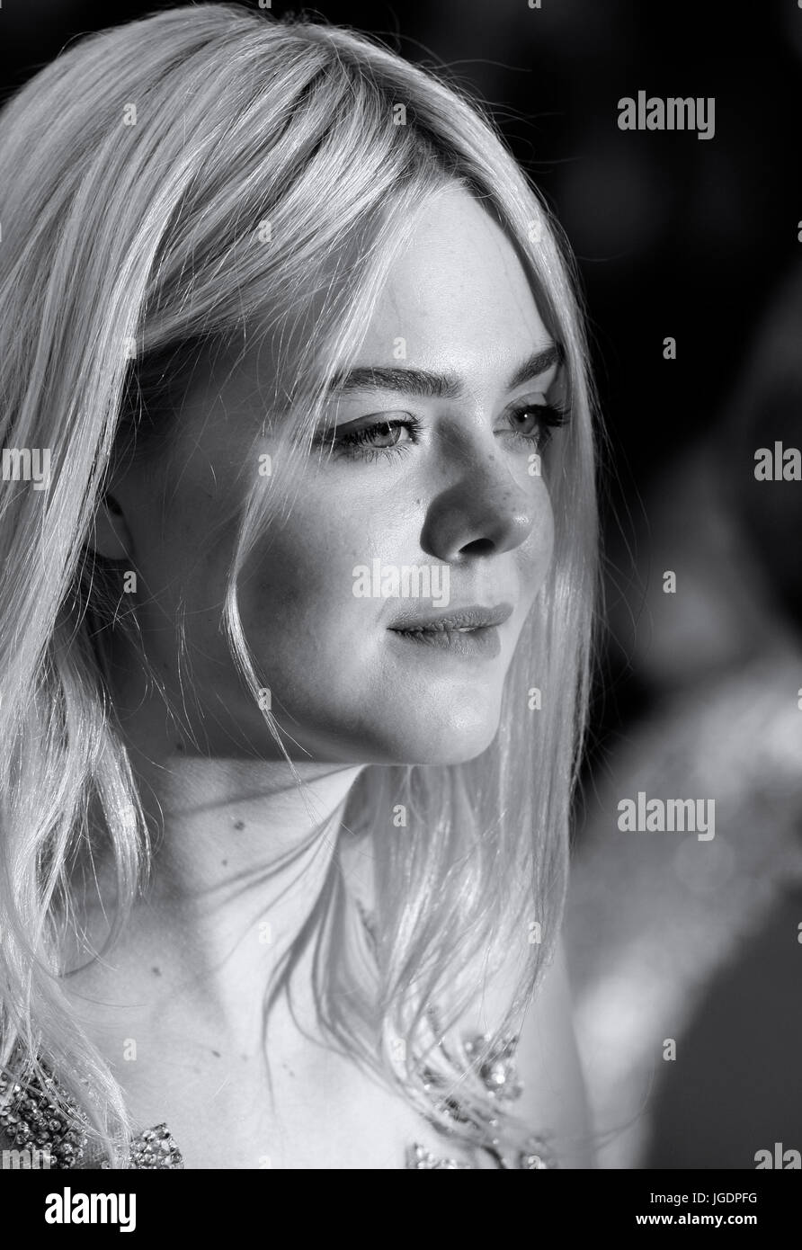 Actress Elle Fanning departs after the How To Talk To Girls At Parties screening during the 70th annual Cannes Film Festival at Palais des Festivals on May 21, 2017 in Cannes, France. Stock Photo
