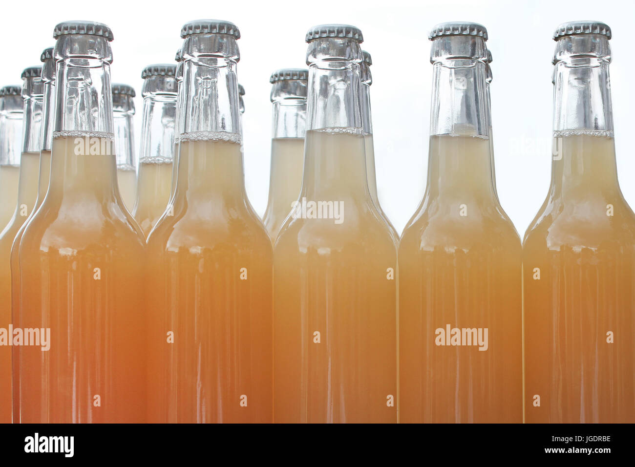 Bottles of cider. White background Stock Photo Alamy