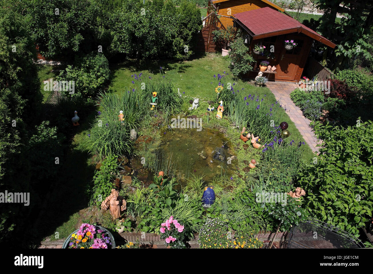 Garden with pond and summer house, Garten mit Teich und Gartenhaus Stock Photo
