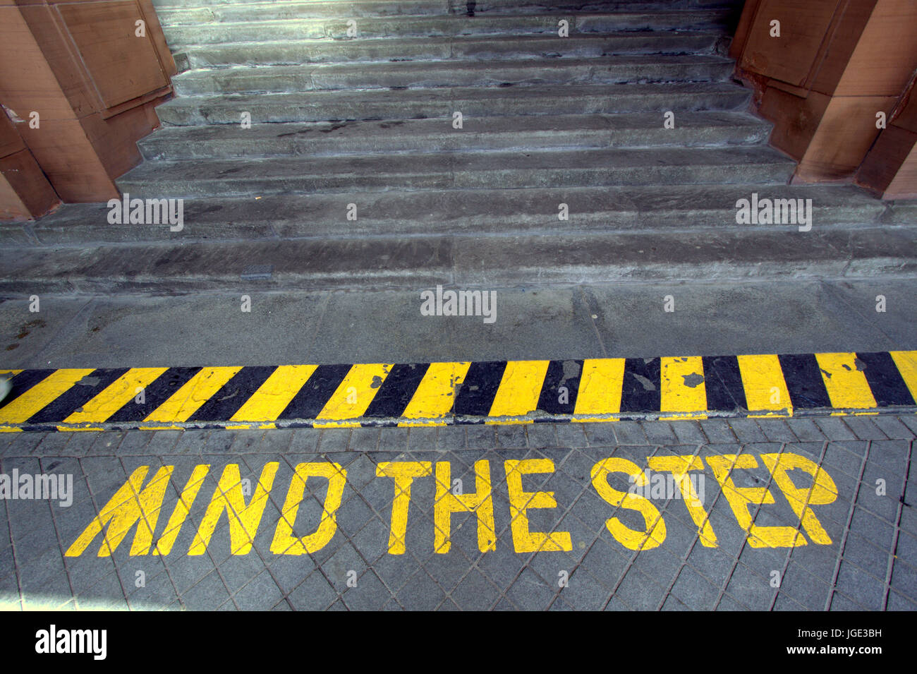 mind the step sign on stairs Stock Photo