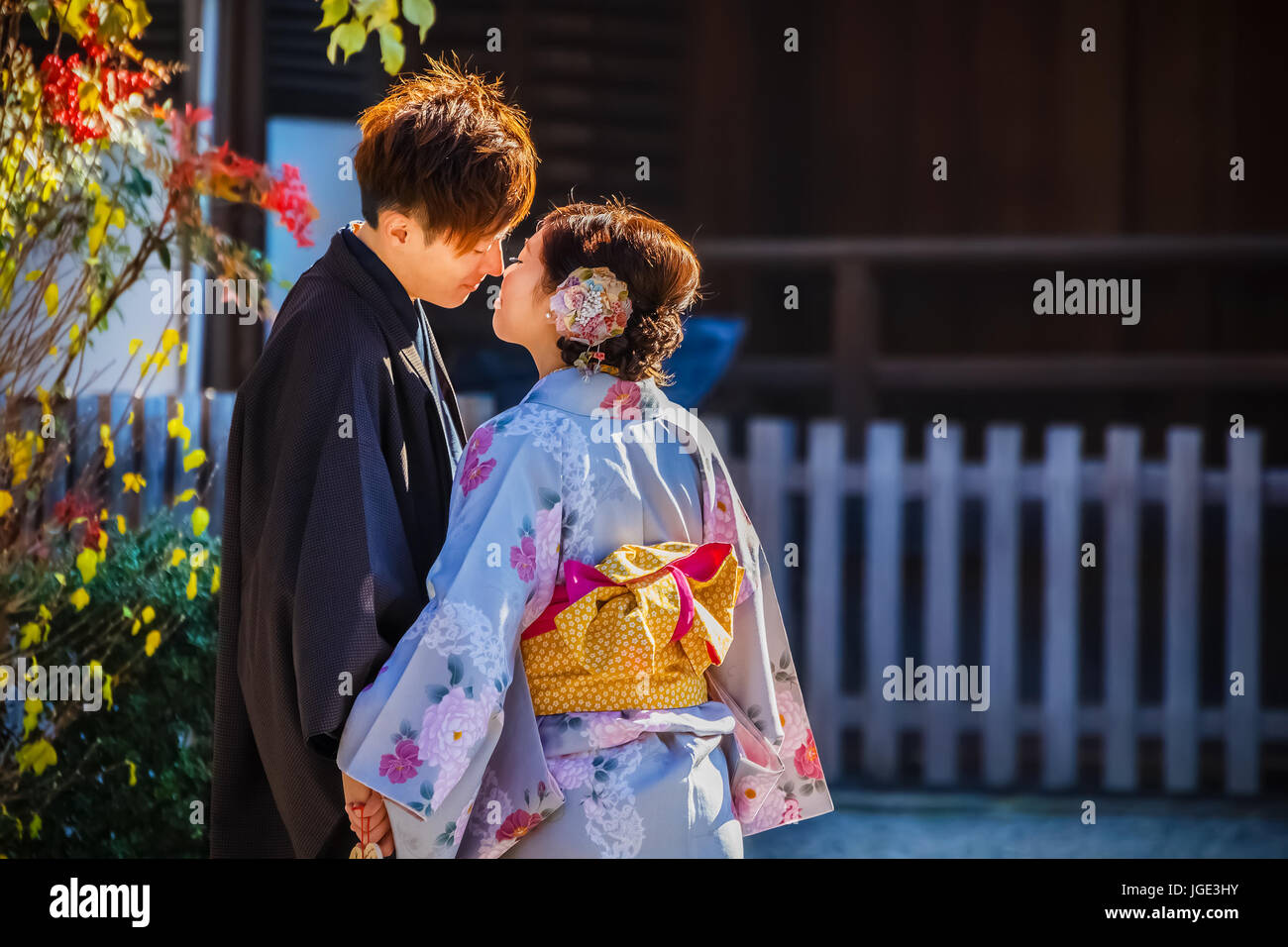 Unidentified groom and bride dress traditional costume for their wedding at Yasaka-jinja Shrine in Kyoto, Japan Stock Photo