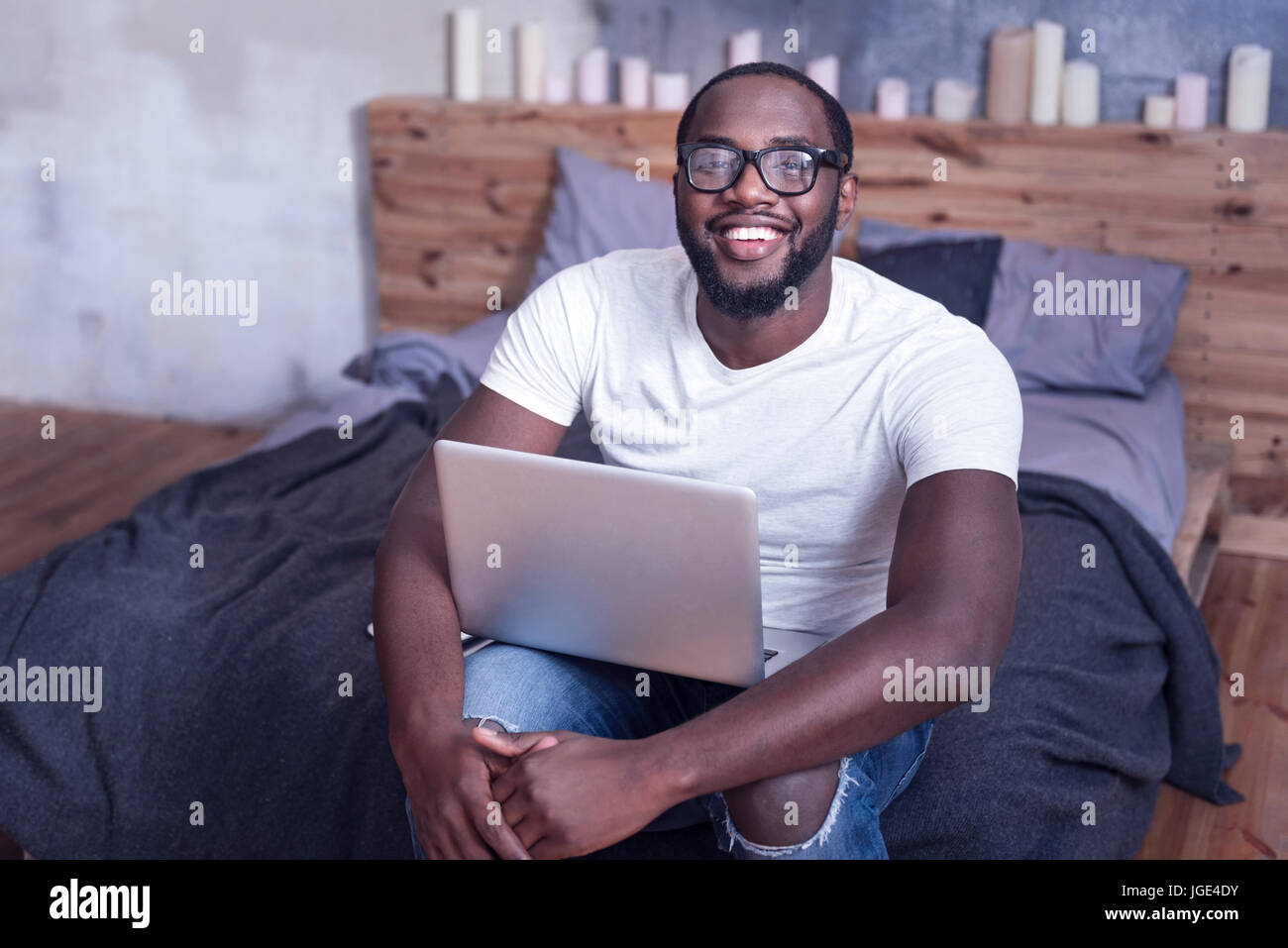 Fashionable young African American working at home Stock Photo