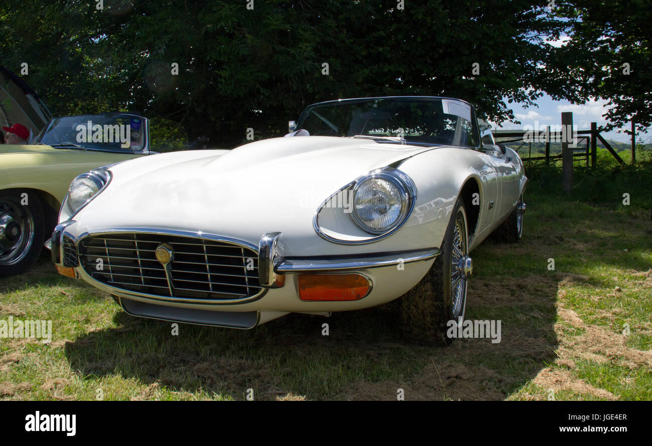 Front view of a white Jaguar sports car on display at a classic car show in Wales, UK Stock Photo