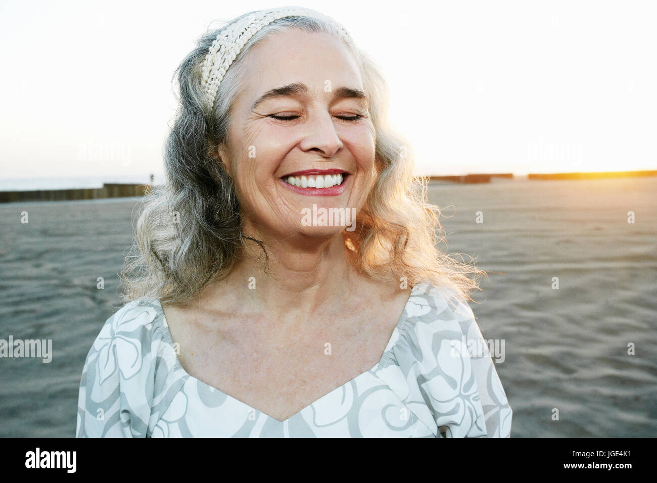 Portrait of smiling older Caucasian woman at beach Stock Photo - Alamy