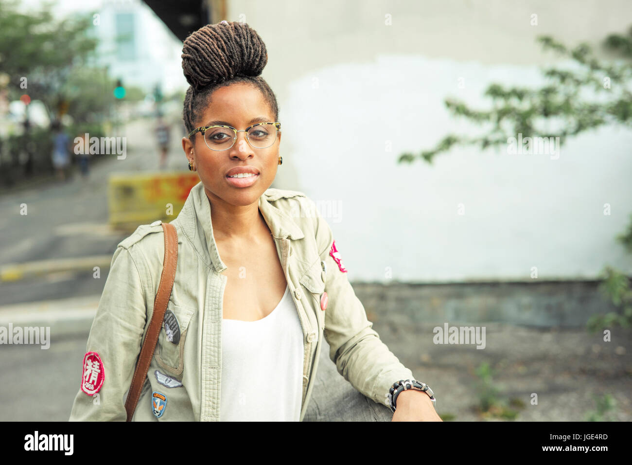 Woman wearing glasses braids hi-res stock photography and images - Alamy