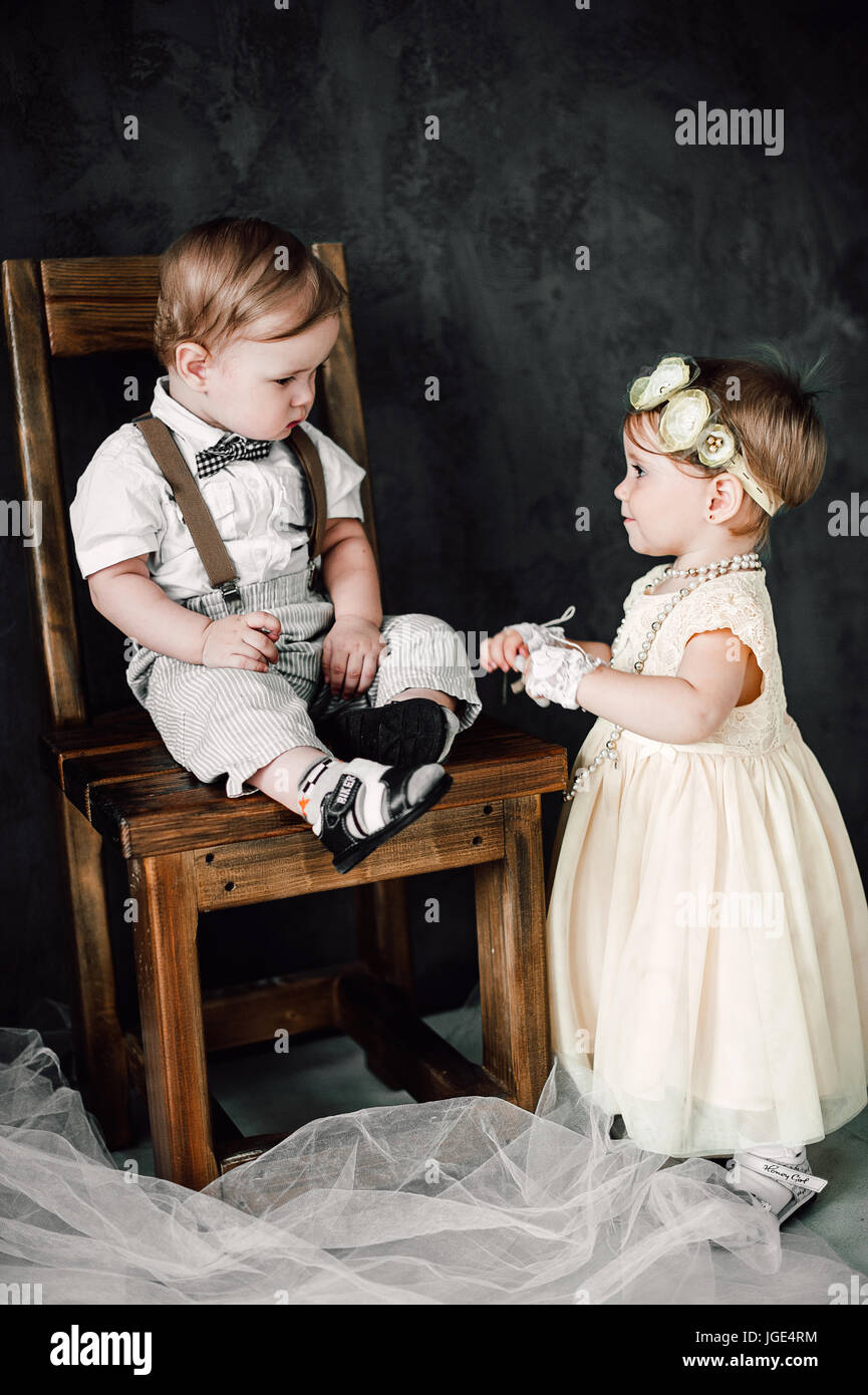 boy dressed as baby girl