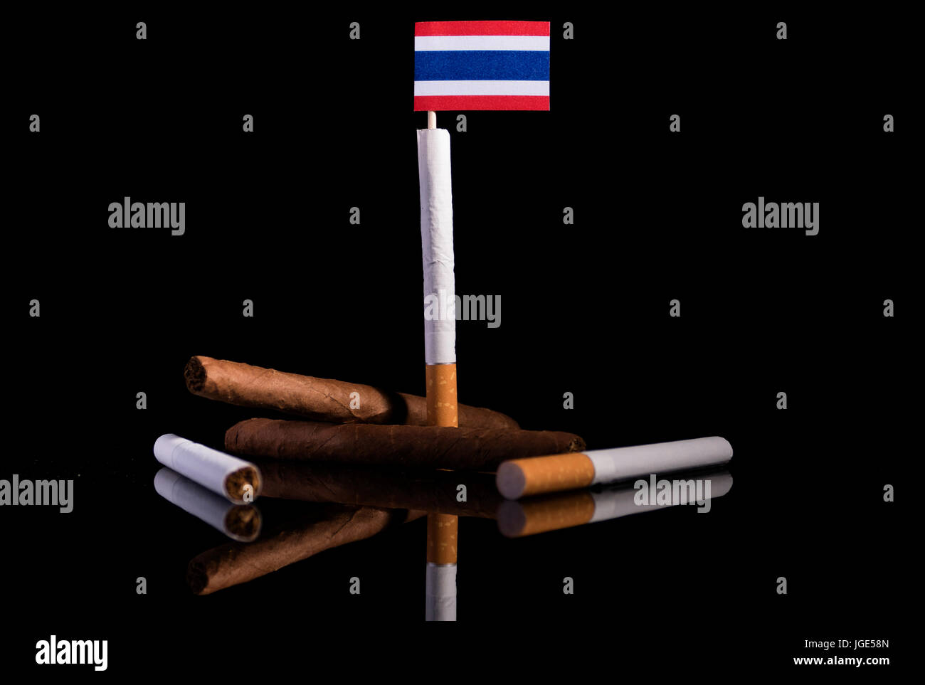 Thai flag with cigarettes and cigars. Tobacco Industry concept. Stock Photo