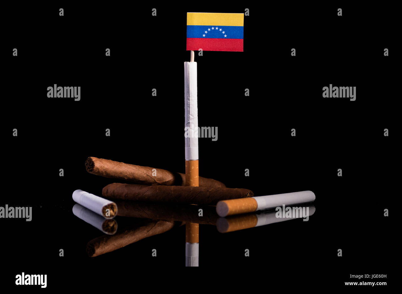Venezuelan flag with cigarettes and cigars. Tobacco Industry concept Stock  Photo