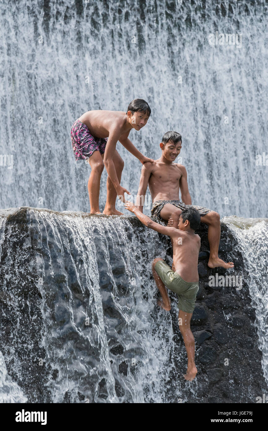 Indonisaian  boy river swim alamy Alamy