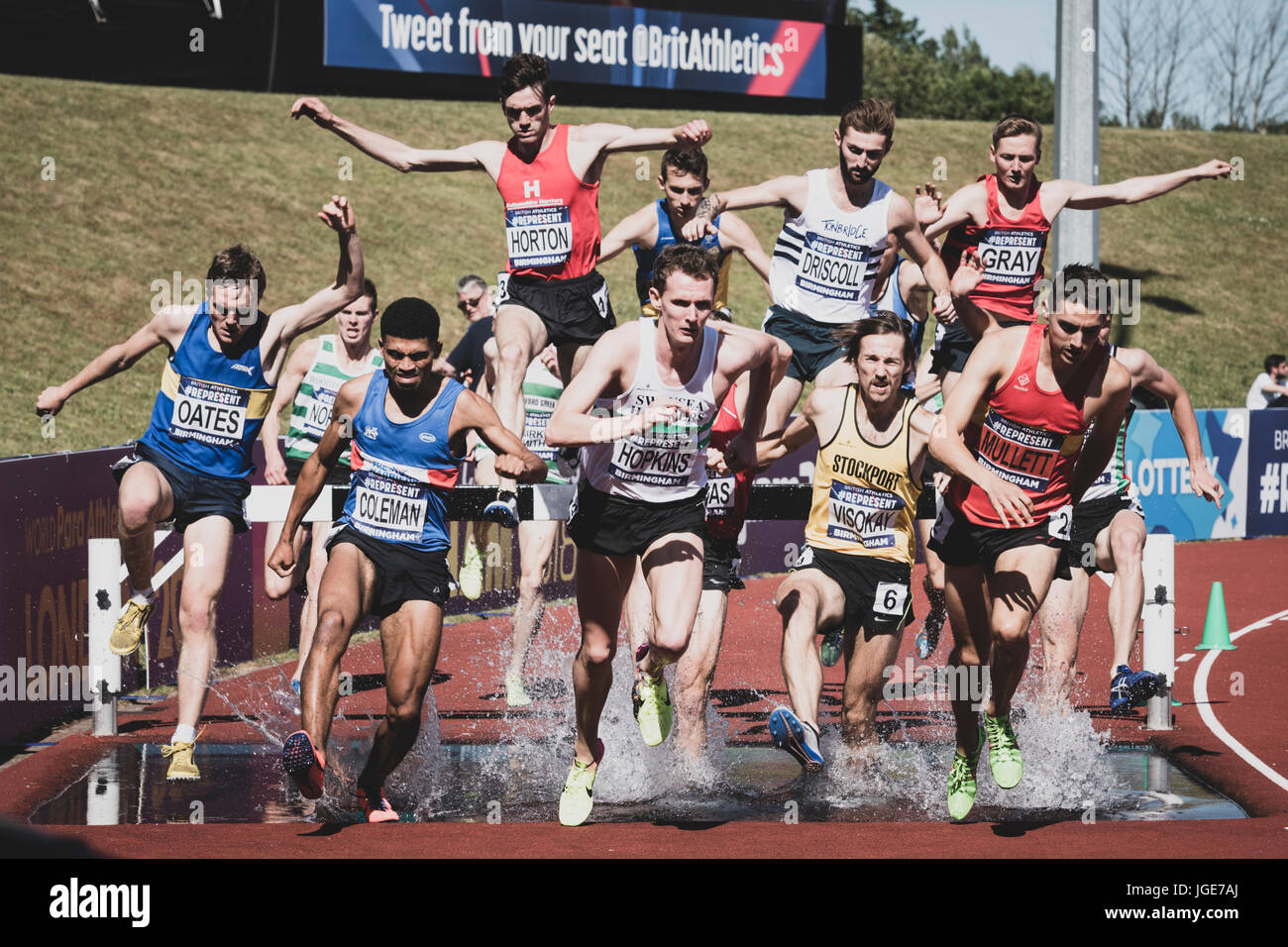 The 3000m steeplechase clears the water jump at the British Athletics Championships and World Trials at Birmingham, United Kingdom on 1-2 July 2017 Stock Photo