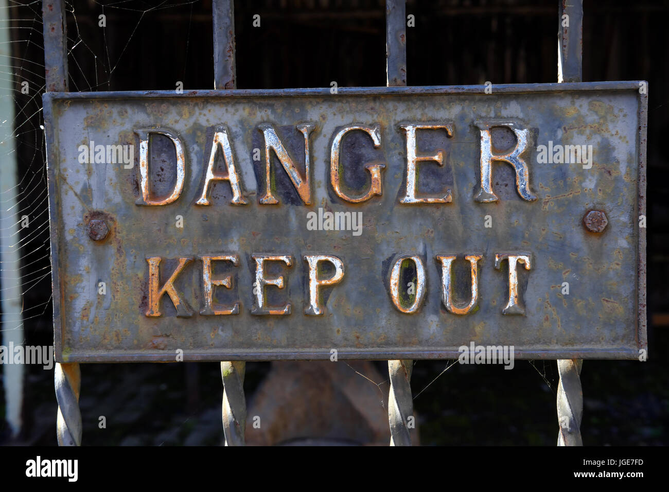 Danger Keep Out Rusty Plate Stock Photo - Alamy