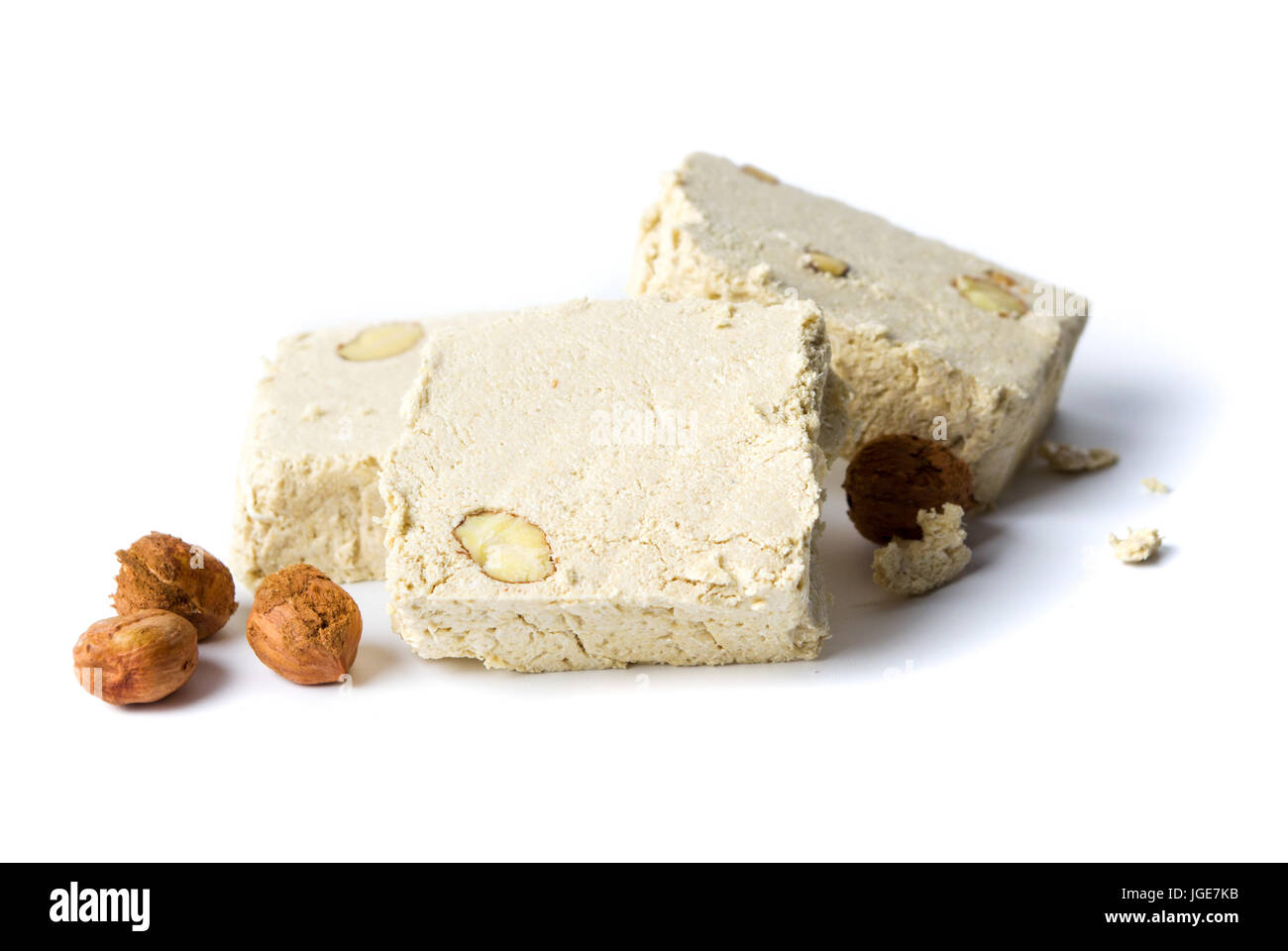 Hazelnut halva dessert slices on white background Stock Photo Alamy