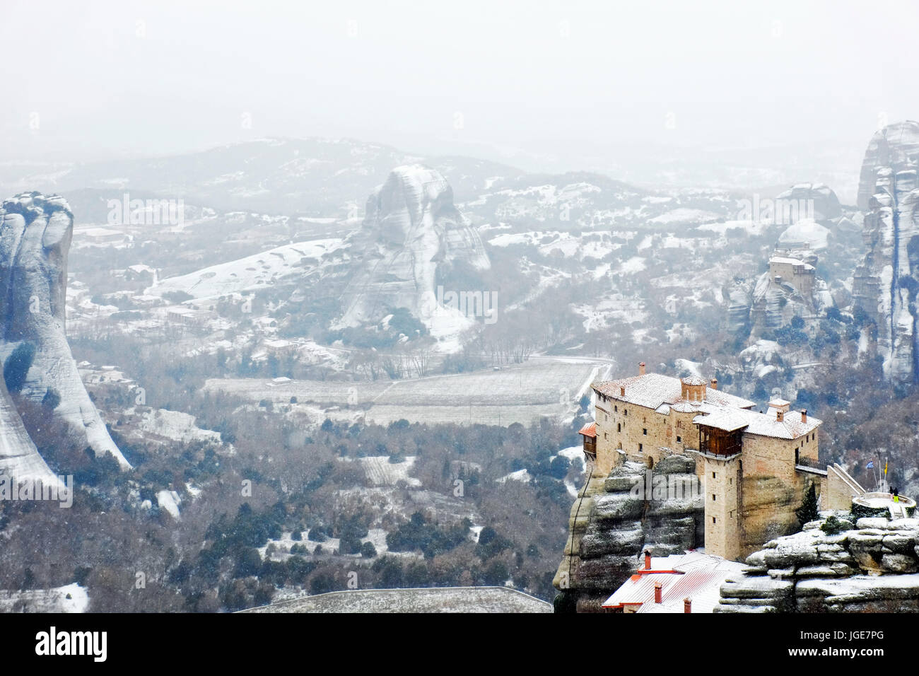 The Holy Monastery of Rousanou under heavy snow , Meteora, Kalabaka, Greece Stock Photo