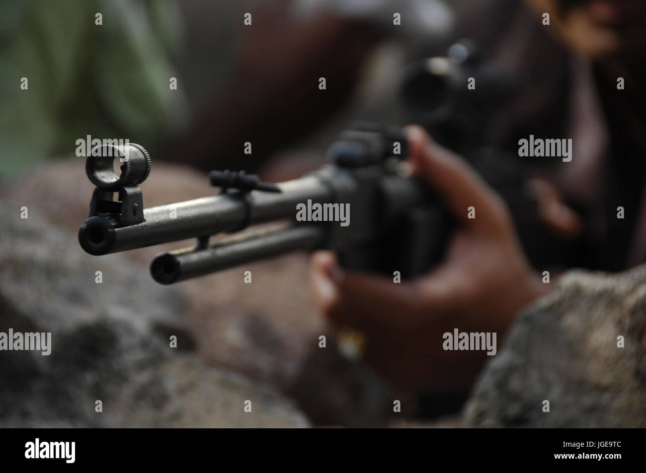 Male hand with revolver Stock Photo - Alamy