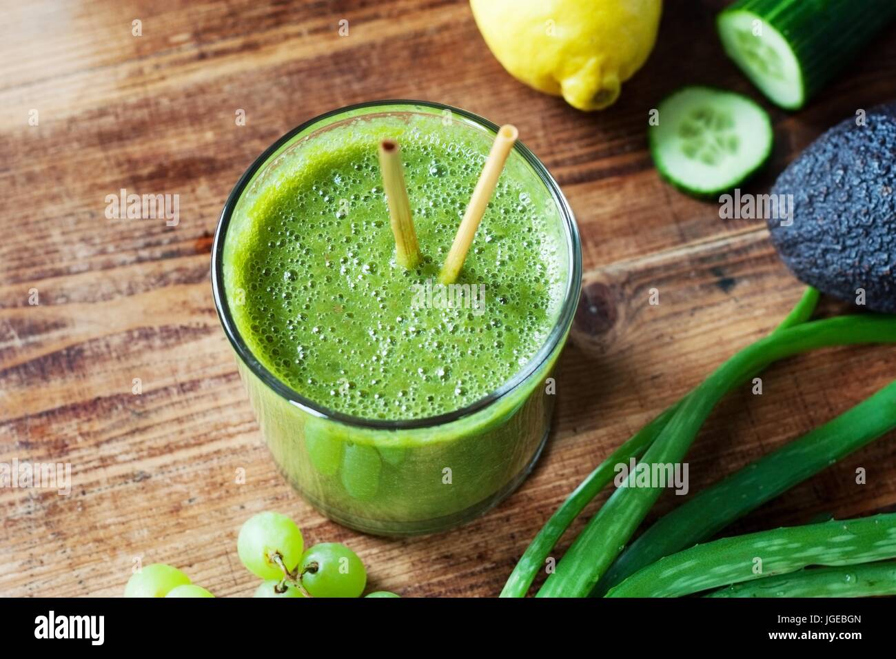 Green Smoothie with lettuce, lemon, banana, cucumber, grapes and aloe