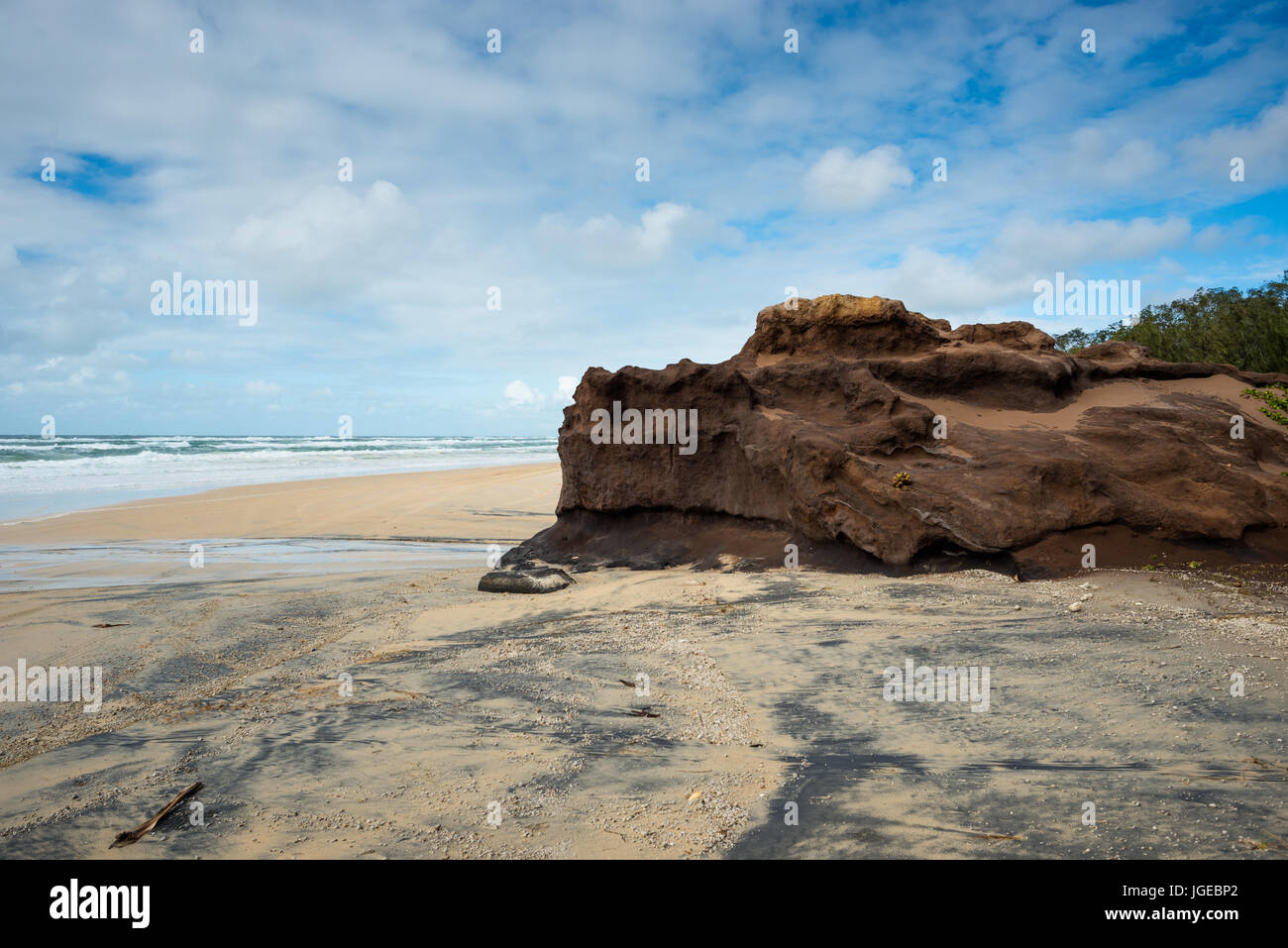 Coffee rocks made of sand on the beach at Fraser Island, Queensland, Australia. Stock Photo