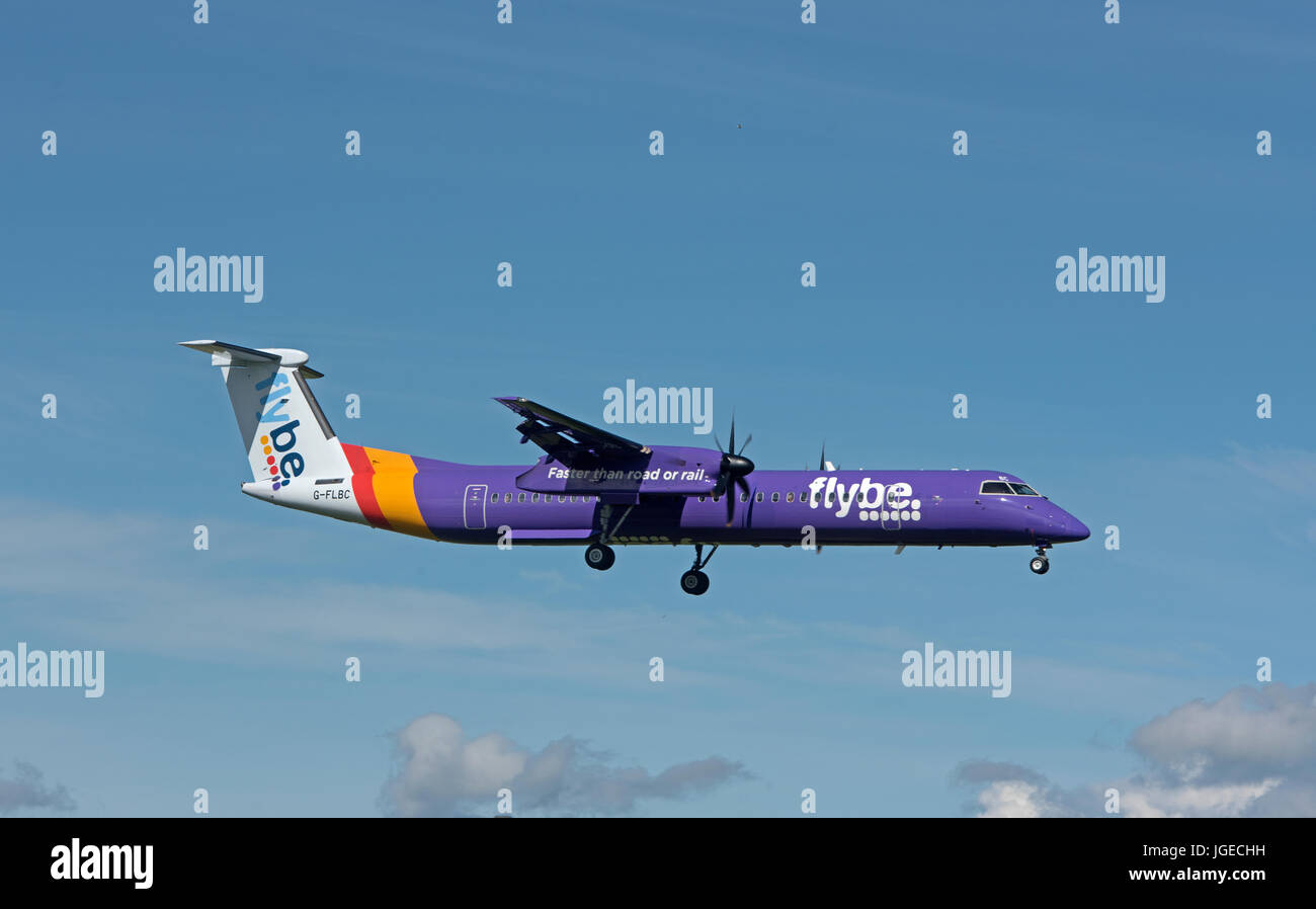 An Flybe internal Scheduled flight on approach to Inverness Dalcross Airfield in the Scottish Highlands. UK. Stock Photo