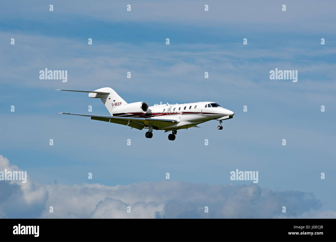 A German registered Cessna 750 Citation X on final approach to Inverness Airport in the Scottish Highlands North East Scotland. Stock Photo