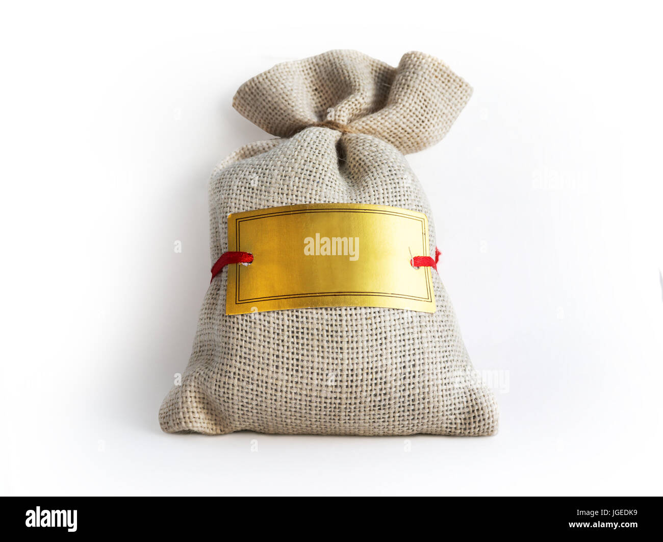 Grey pouch of burlap with a blank label for your text. Gift box with copy space Stock Photo