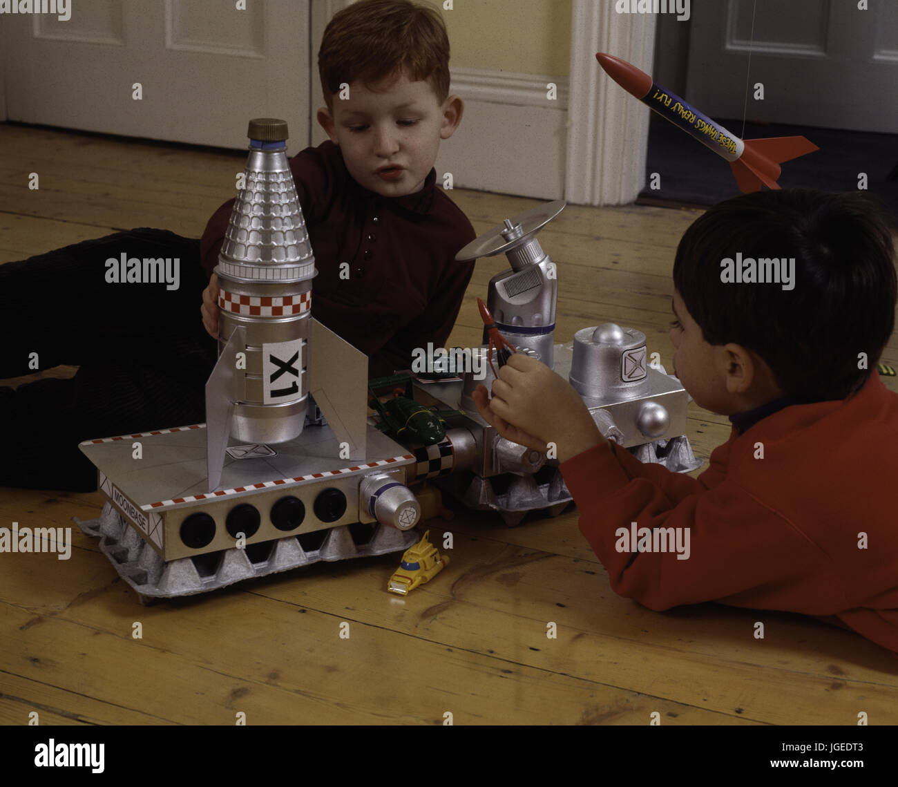 Boys with homemade rocket launcher Stock Photo - Alamy